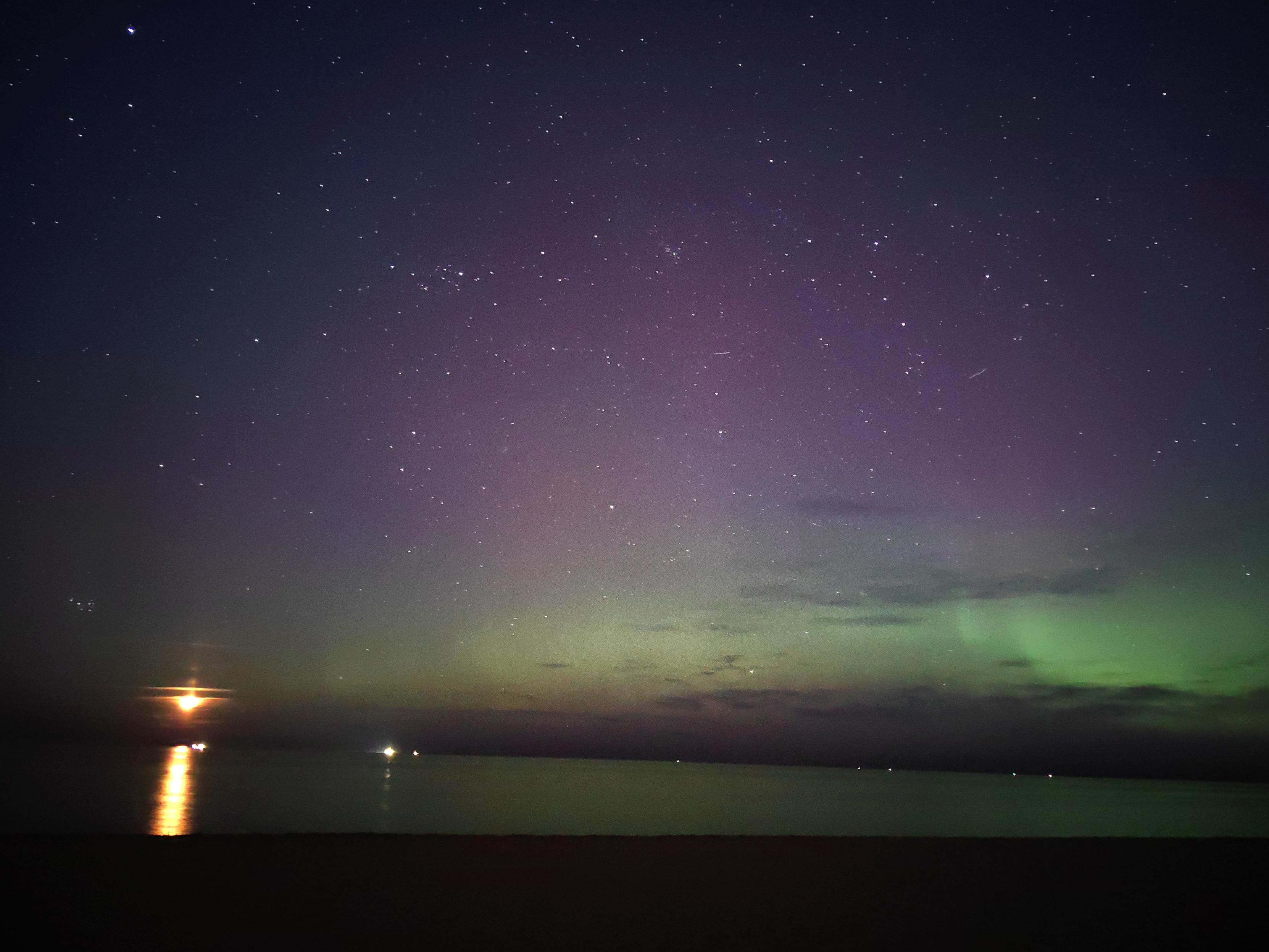 Nigh sky, Aurora, sea, some ships and a setting moon